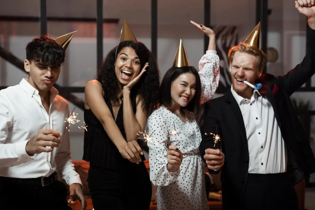 front view people holding sparklers new year s eve party ezgif.com jpg to webp converter